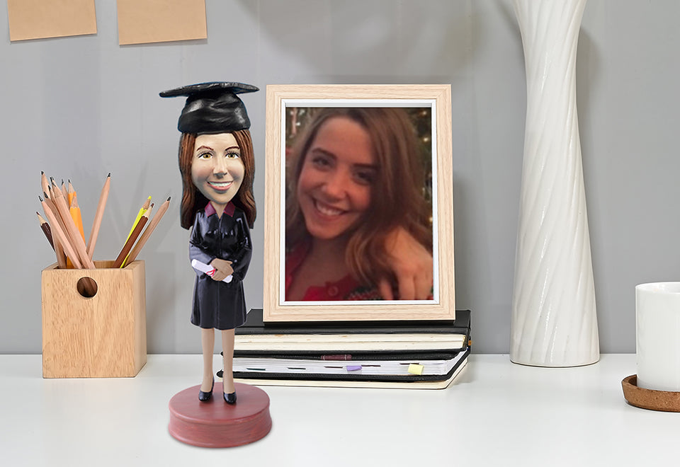 Graduate Holding Her Diploma